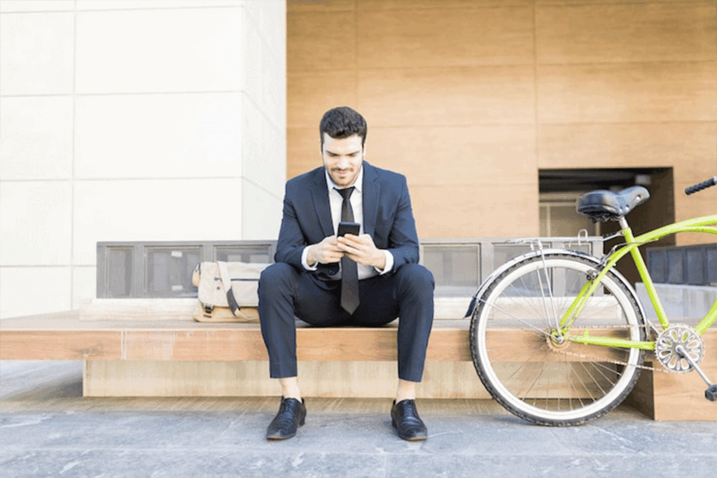 man preparing to ride bike to work