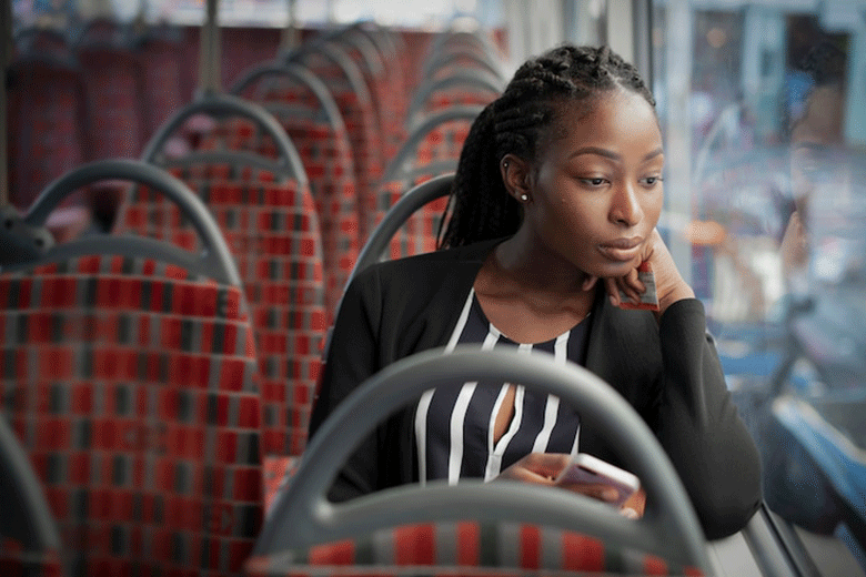 woman taking the bus to work