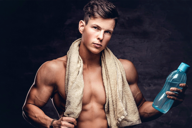 muscular man with towel