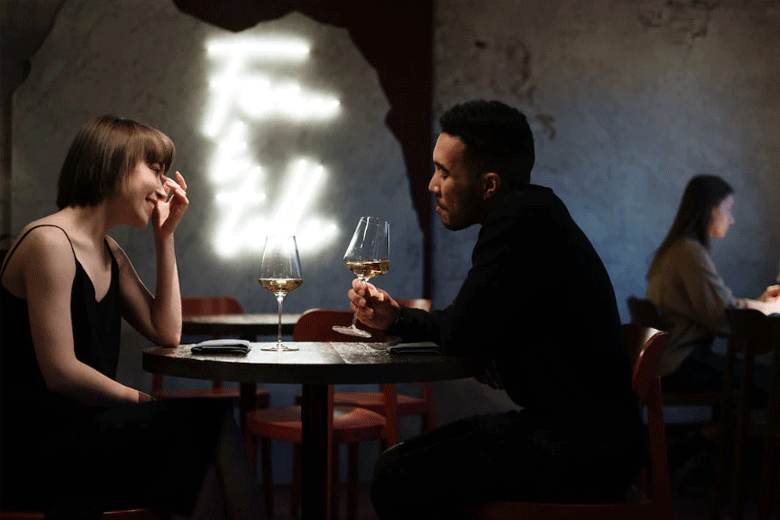couple talking over wine