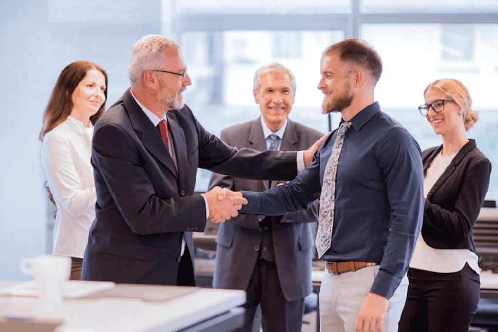 shaking hands at office