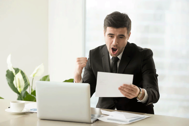 A man excited to read a document